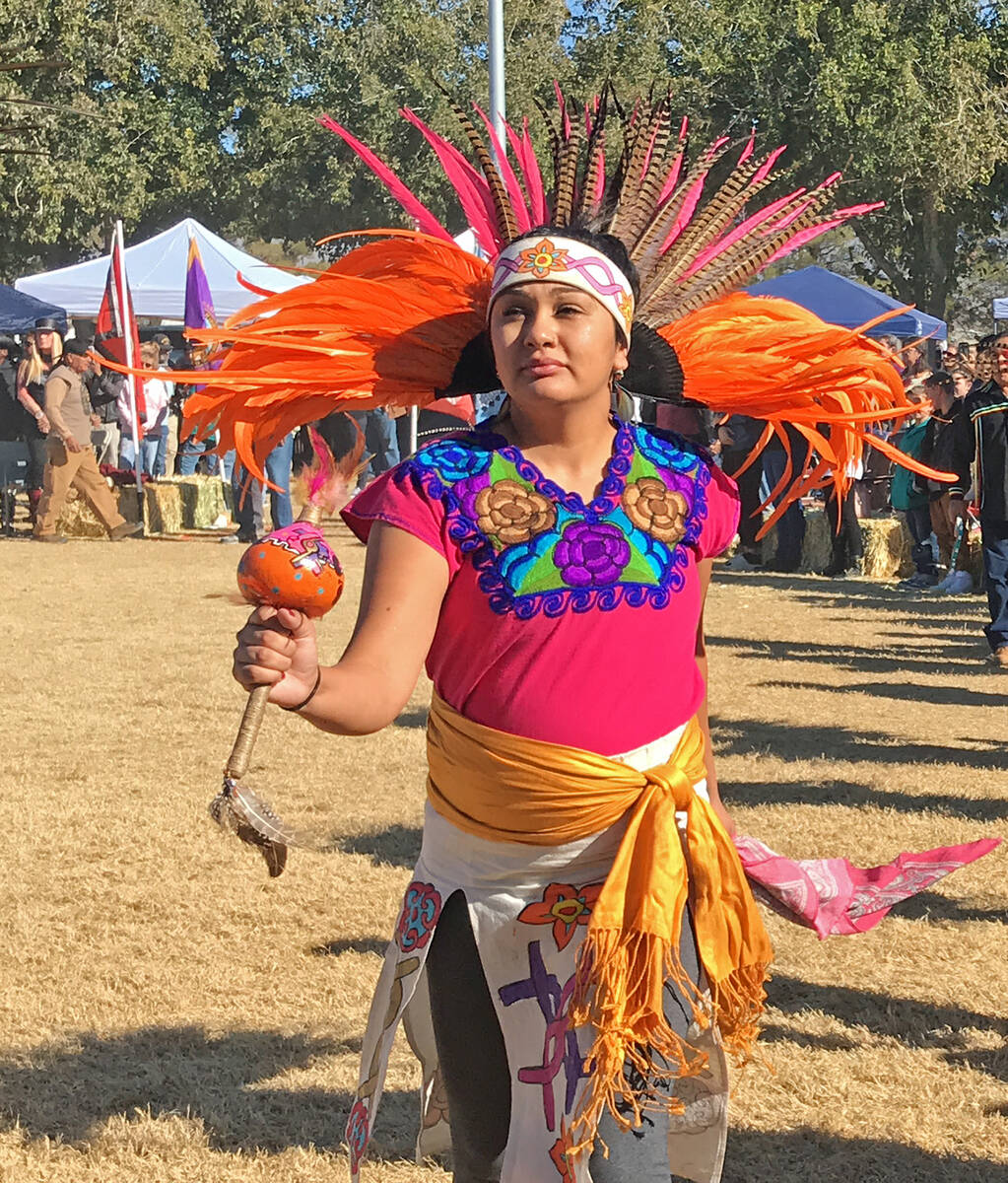 Robin Hebrock/Pahrump Valley Times A Native American dancer in traditional garb is shown absorb ...