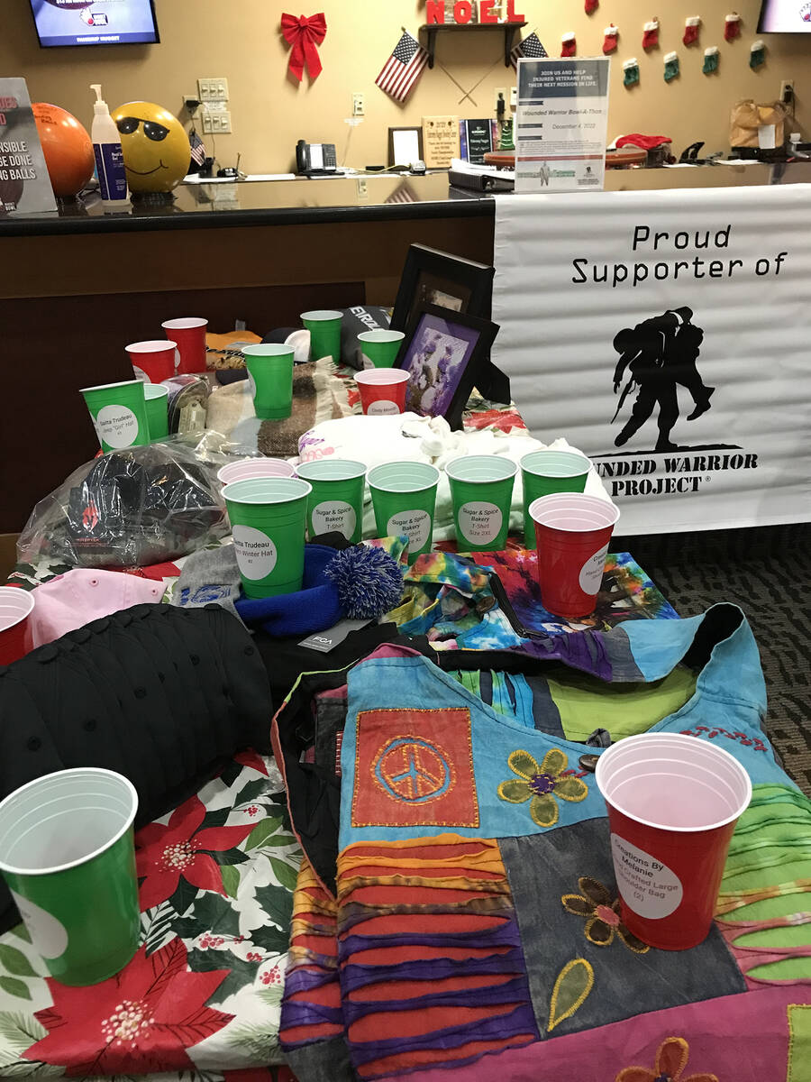 Robin Hebrock/Pahrump Valley Times There were so many raffle prizes at the Wounded Warrior Bowl ...