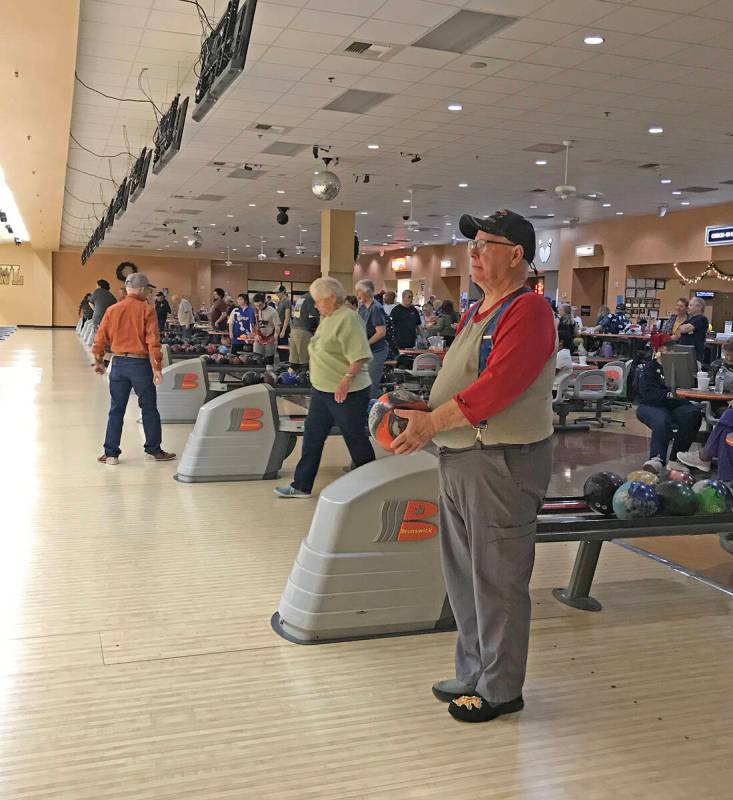 Robin Hebrock/Pahrump Valley Times A bowler pauses to ready himself before launching his ball d ...