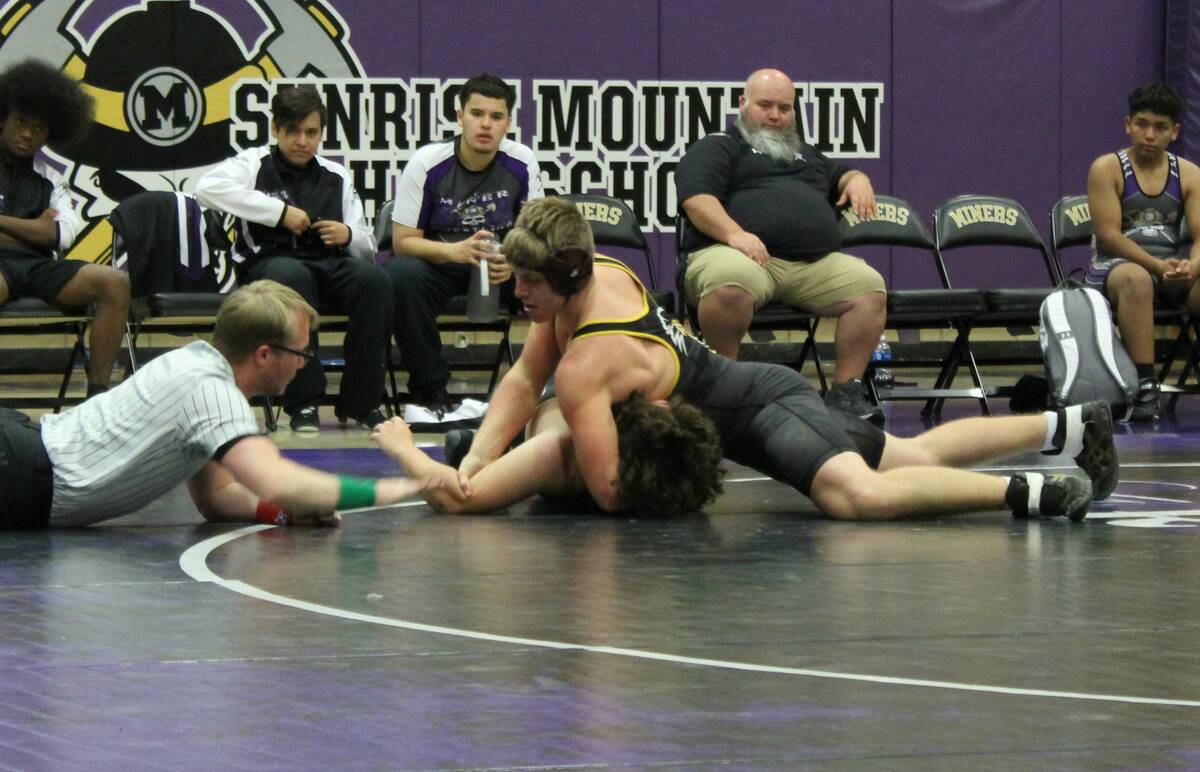 Danny Smyth/Pahrump Valley Times Senior Tannor Hanks pinning his opponent for the win in the Tr ...
