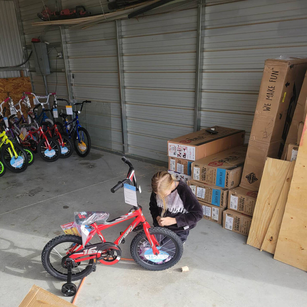 Special to the Pahrump Valley Times Avery Sampson is pictured assembling a bicycle at her home ...