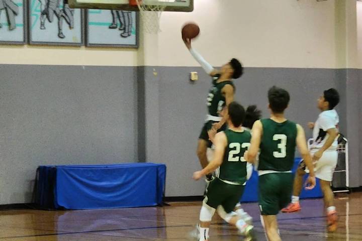 Danny Smyth/Pahrump Valley Times Senior guard Effrain Moreno (2) led the Beatty Hornets to a 61 ...