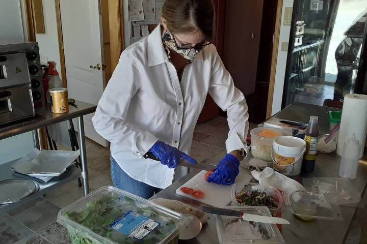 Horace Langford Jr./Pahrump Valley Times file Pam Tyler prepares a panini sandwich, which is on ...