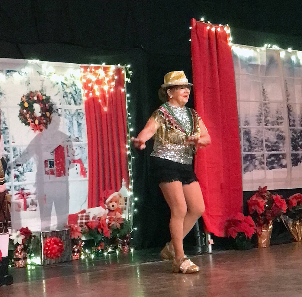 Robin Hebrock/Pahrump Valley Times Teri Rogers performs a solo dance routine at the Christmas b ...