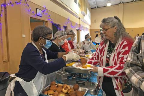 Robin Hebrock/Pahrump Valley Times Volunteers are pictured manning the buffet at the Pahrump Ho ...