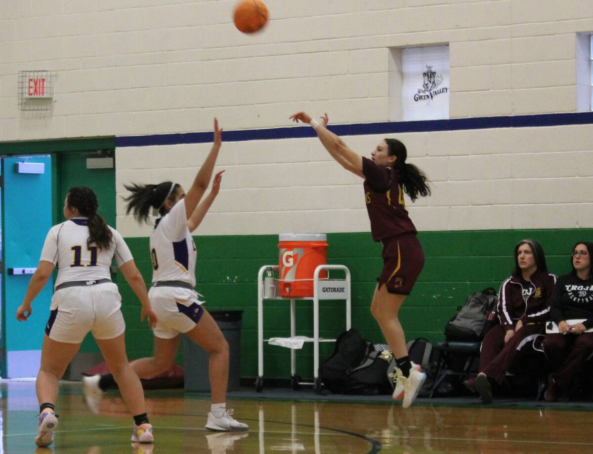 Danny Smyth/Pahrump Valley Times Pahrump Valley senior guard Adryanna Avena (4) shooting over h ...