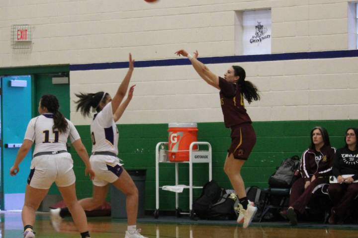 Danny Smyth/Pahrump Valley Times Pahrump Valley senior guard Adryanna Avena (4) shooting over h ...