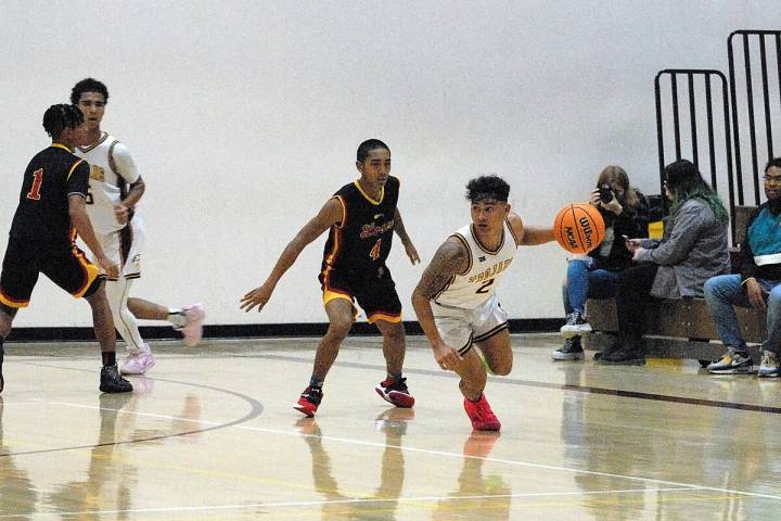 Horace Langford Jr./Pahrump Valley Times Pahrump Valley guard Makoa Batongbacal (2) dribbles pa ...