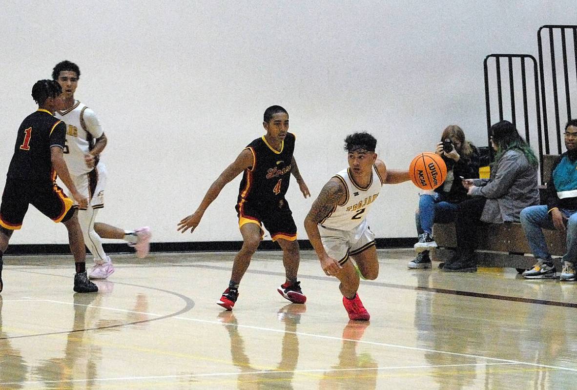 Horace Langford Jr./Pahrump Valley Times Pahrump Valley guard Makoa Batongbacal (2) dribbles pa ...