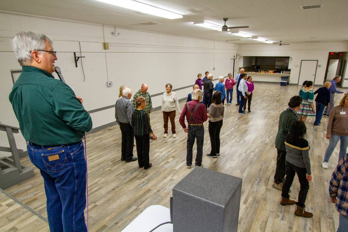 John Clausen/Special to the Pahrump Valley Times Ned Newberg calls out the line-dancing moves f ...