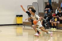 Horace Langford Jr./Pahrump Valley Times Pahrump Valley guard Daxton Whittle (5) dribbling past ...