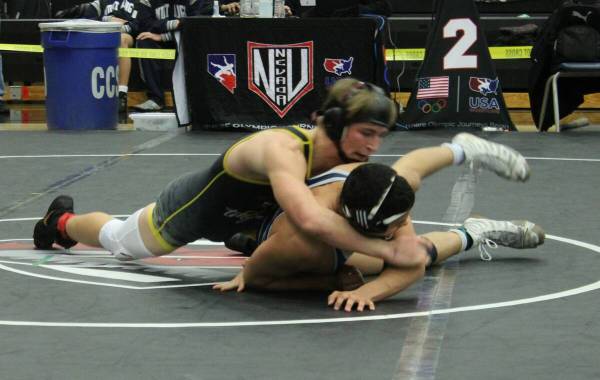 Danny Smyth/Pahrump Valley Times Junior Brennen Benedict attempting a cross-face against his op ...