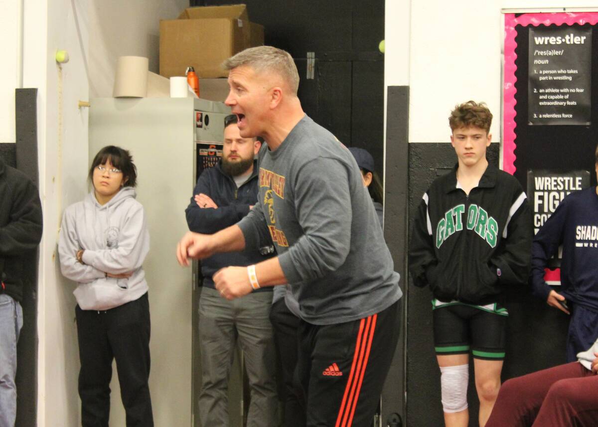 Danny Smyth/Pahrump Valley Times Trojans' wrestling head coach Craig Rieger yelling instruction ...