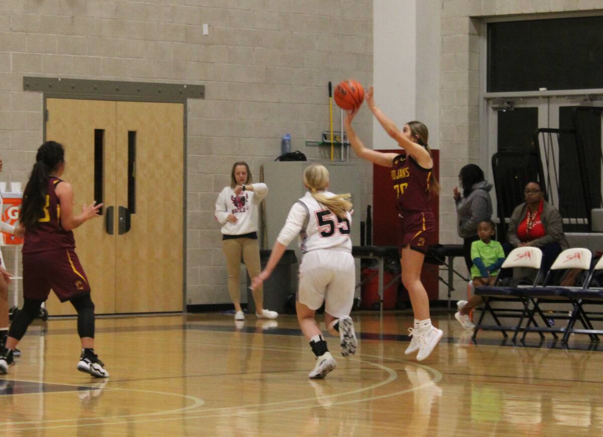 Danny Smyth/Pahrump Valley Times Junior guard Avery Moore (20) finished with a team-high 11 poi ...