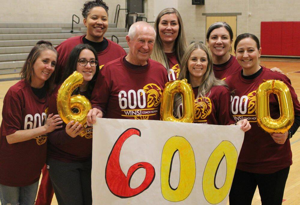 Danny Smyth/Pahrump Valley Times Past players who were on the team when Bob Hopkins got his 500 ...