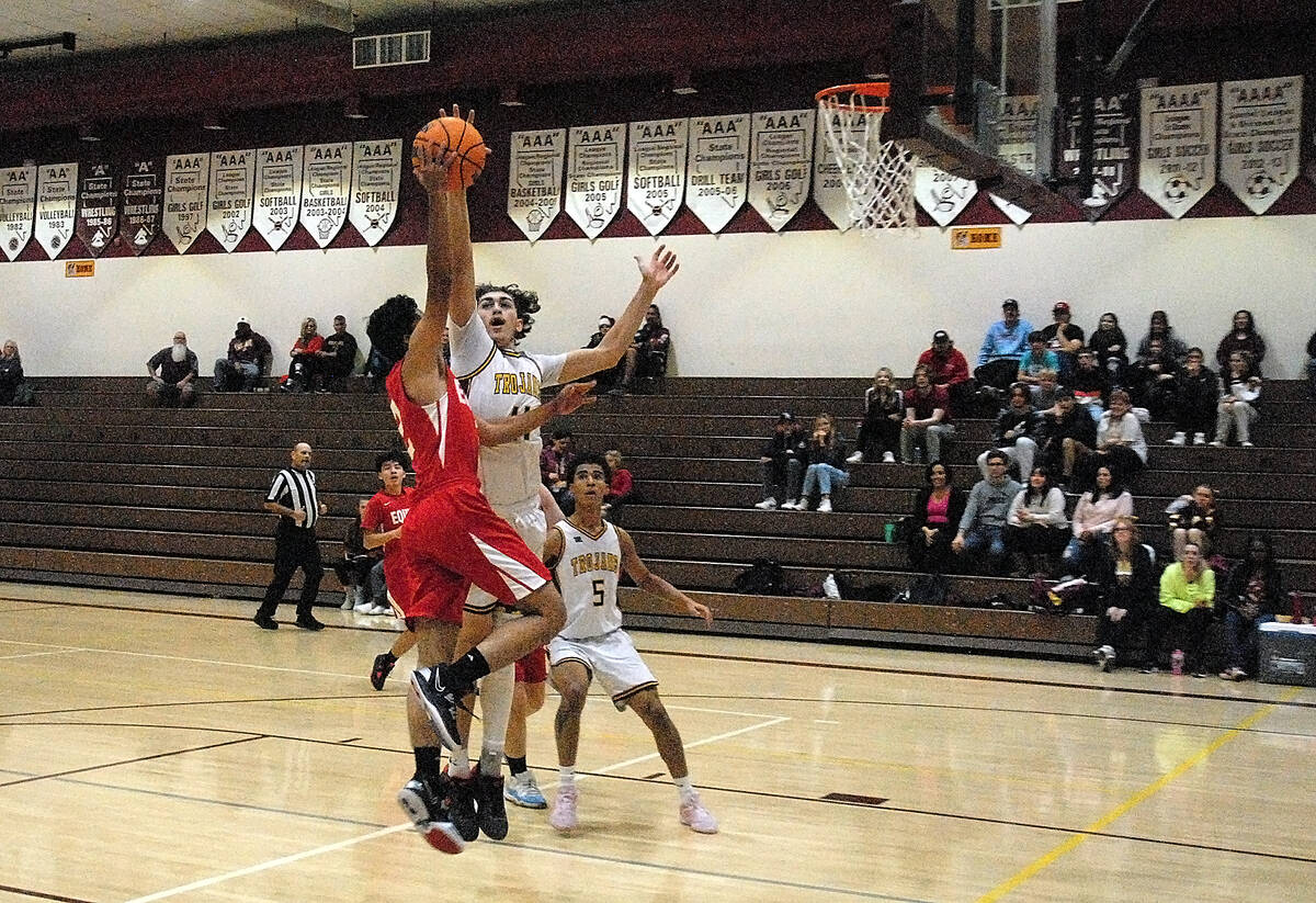 Horace Langford Jr./Pahrump Valley Times Forward Ryder Cordova (11) going up for a block agains ...