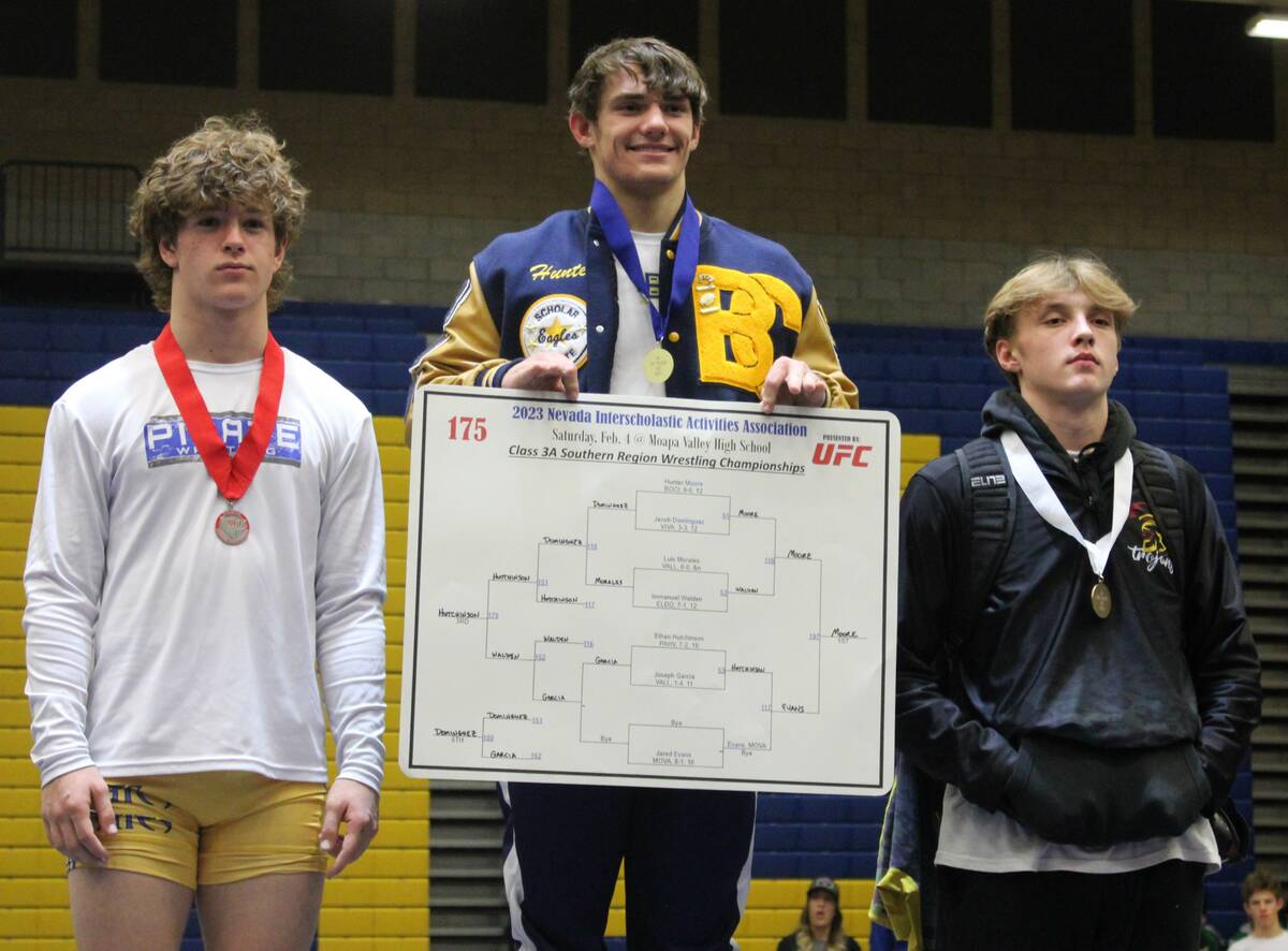 Danny Smyth/Pahrump Valley Times Sophomore Ethan Hutchinson (right) finished in third place at ...