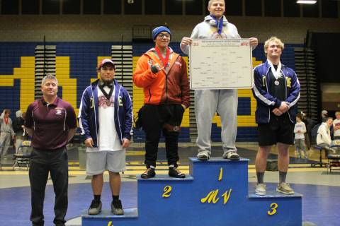 Danny Smyth/Pahrump Valley Times Senior Trojan Tannor Hanks (second from right) won gold at the ...