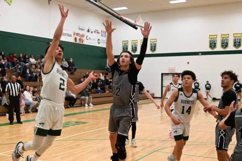 Richard Stephens/Special to Pahrump Valley Times Senior guard Effrain Moreno (2) going up for a ...