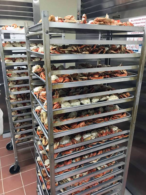 Robin Hebrock/Pahrump Valley Times Tray upon tray laden with Dungeness crab sits in wait for th ...