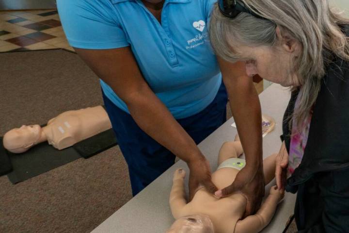 John Clausen/Special to the Pahrump Valley Times Darla Miller, left, trains a student on proper ...