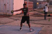 Danny Smyth/Tonopah Times Junior Jason Motton finished the discus throwing event with a distanc ...