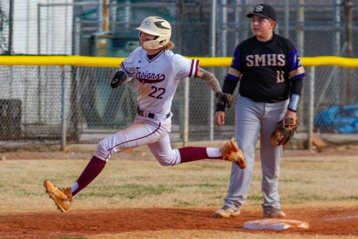 John Clausen/Pahrump Valley Times Senior Dustin Lopez (22) rounding third base to head home for ...