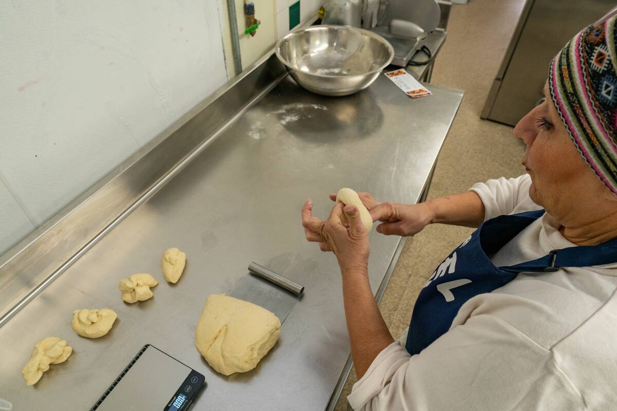 John Clausen/Pahrump Valley Times Shelly Fisher kneads dough at her new Shelly Belly NY Bagels ...