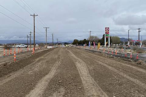 Photo Courtesy of Nye County Public Works The photo shows the view of Basin Avenue looking west ...