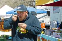 Robin Hebrock/Pahrump Valley Times A Chili Cook Off attendee can be seen taking a bite of a tas ...