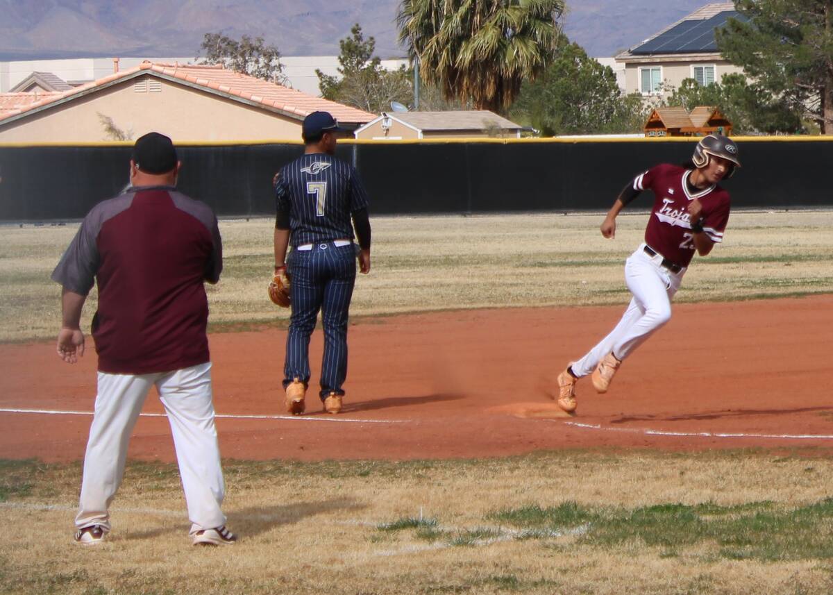 Danny Smyth/Pahrump Valley Times Outfielder Fidel Betancourt (23) rounding third to score in th ...