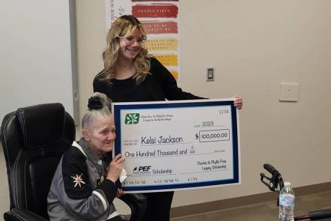 Kelsi Jackson, right, and her grandmother Mary Ann Ratay hold up the celebratory check for the ...