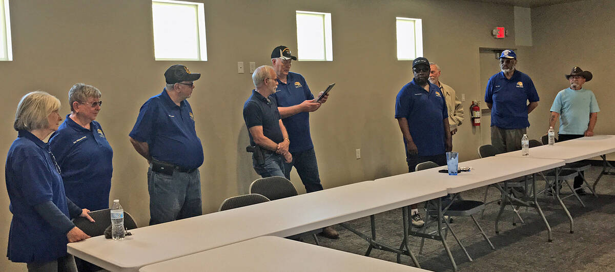 Robin Hebrock/Pahrump Valley Times Former Nye County Commissioner John Koenig, fourth from left ...