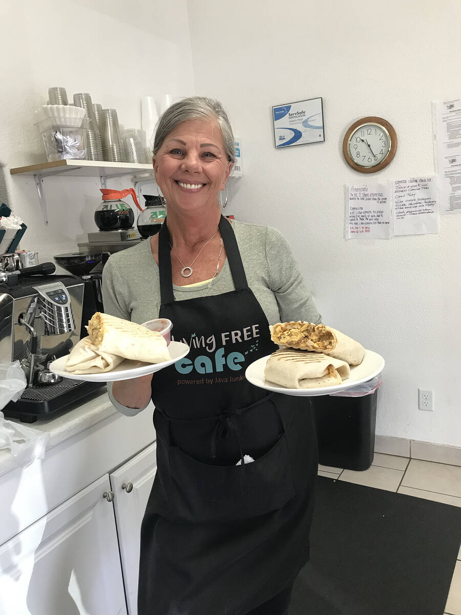 Robin Hebrock/Pahrump Valley Times With two plates of breakfast burritos in hand, a Living Free ...