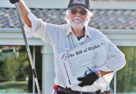 Horace Langford Jr./Pahrump Valley Times Beloved local figure, Ray "The Flagman" Mielzynski, pa ...