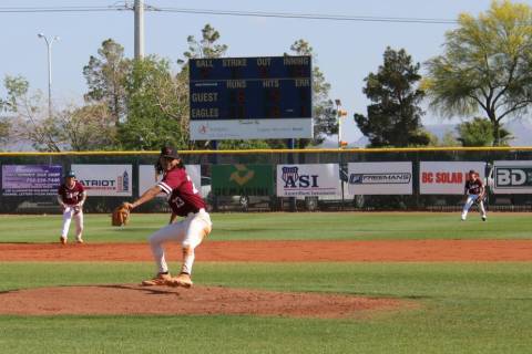 Danny Smyth/Pahrump Valley Times Senior pitcher Fidel Betancourt (23) delivering a pitch as his ...