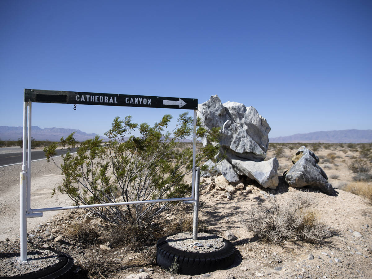 The sign pointing to Cathedral Canyon is shown near a cliff in August 2021. (Bizuayehu Tesfaye/ ...