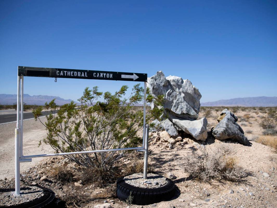 The sign pointing to Cathedral Canyon is shown near a cliff in August 2021. (Bizuayehu Tesfaye/ ...
