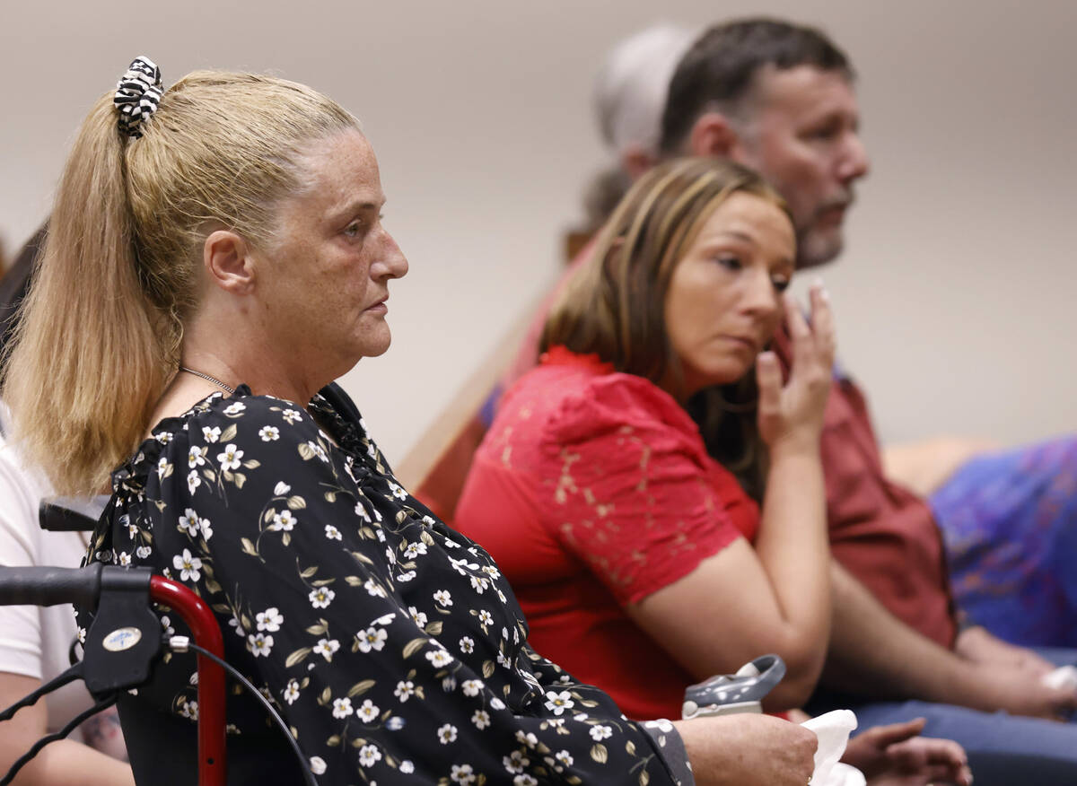 Kassy Robinson, left, the mother of shooting victim Roy Jaggers, her daughter Heather and her h ...