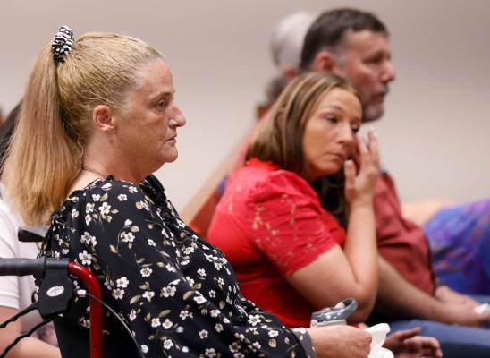 Kassy Robinson, left, the mother of shooting victim Roy Jaggers, her daughter Heather and her h ...