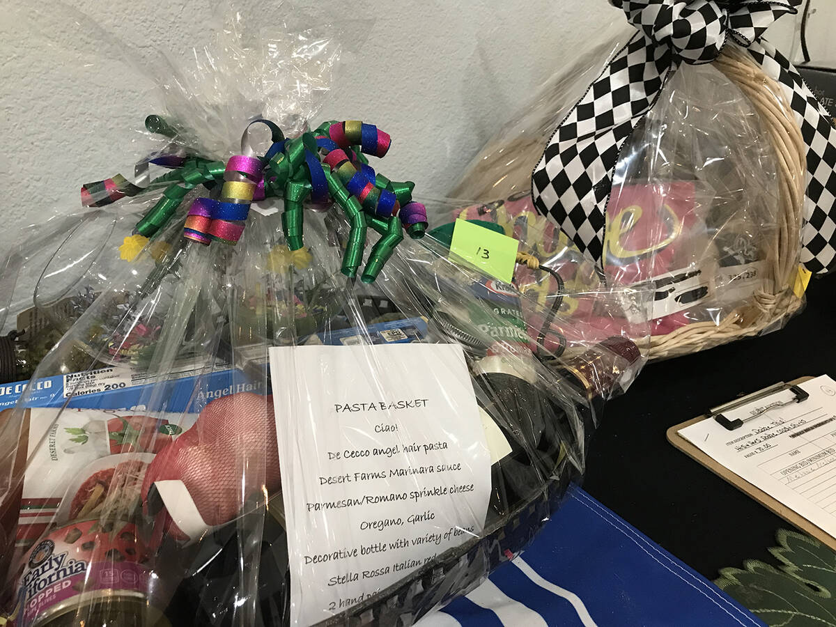 Robin Hebrock/Pahrump Valley Times Baskets filled with all kinds of items were auctioned off vi ...