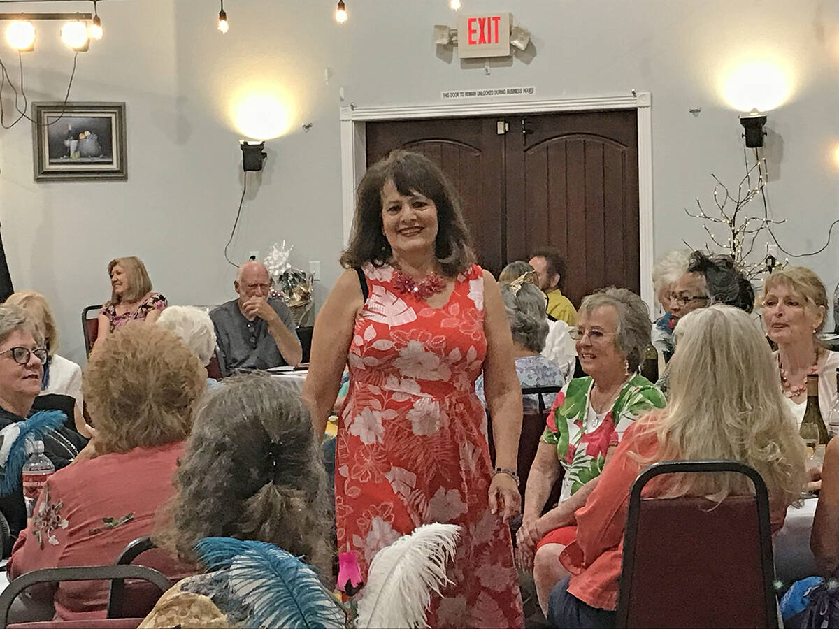 Robin Hebrock/Pahrump Valley Times Attired in a floral red dress perfect for the warmer months, ...