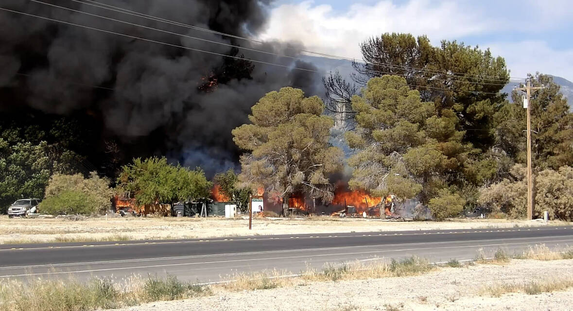 Courtesy KPVM TV Plumes of thick black smoke could be seen throughout the valley as crews were ...