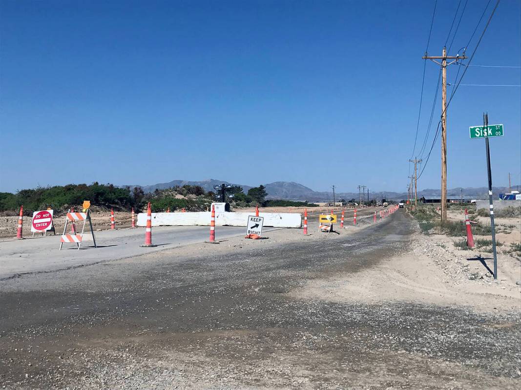Robin Hebrock/Pahrump Valley Times Basin Avenue is currently down to gravel from east of Sisk S ...