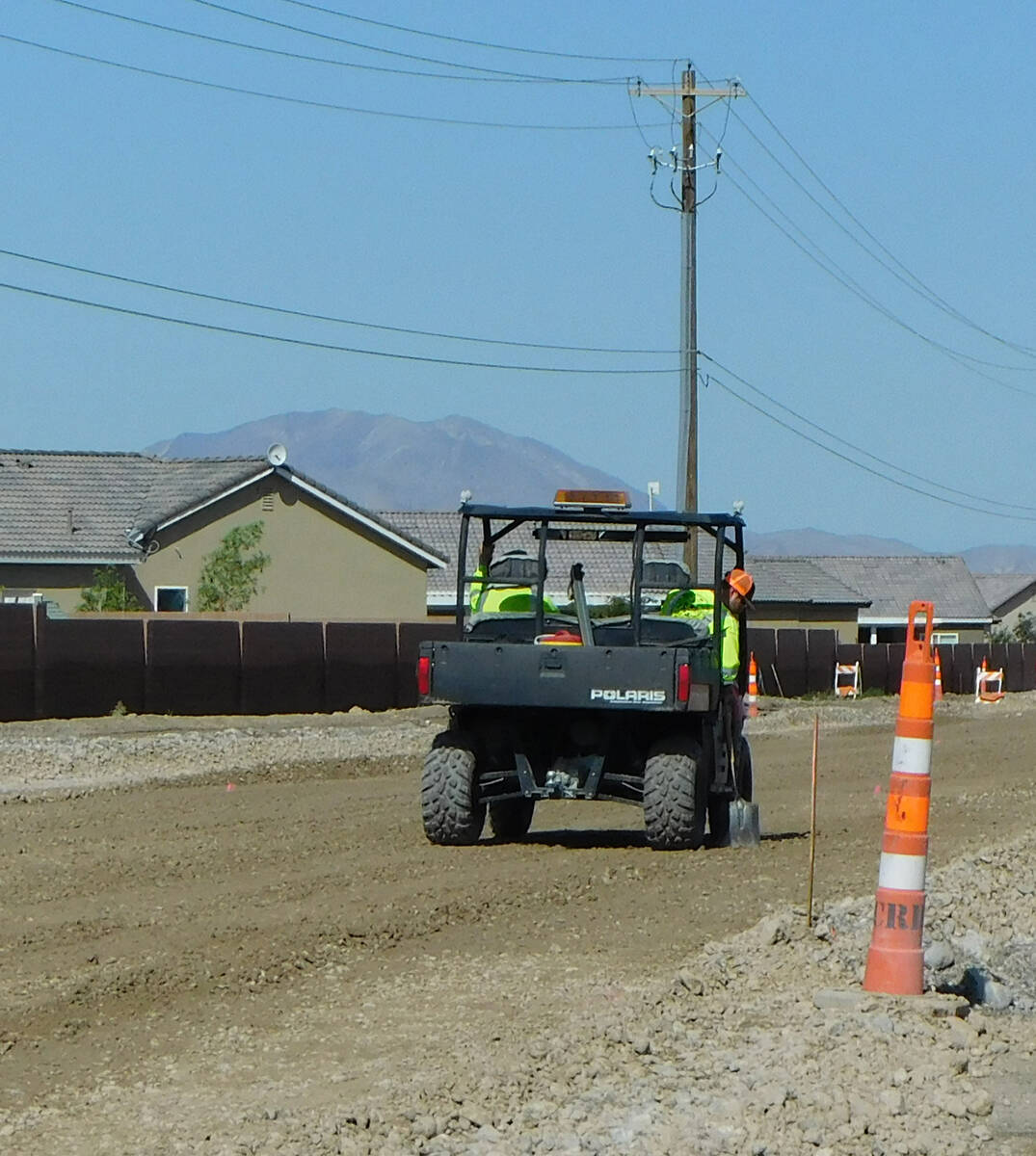 Robin Hebrock/Pahrump Valley Times A member of Nye County Public Works is pictured working on B ...