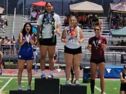 Pahrump Valley High School Athletics Senior Elizabeth Shockley (white shirt) finished in second ...