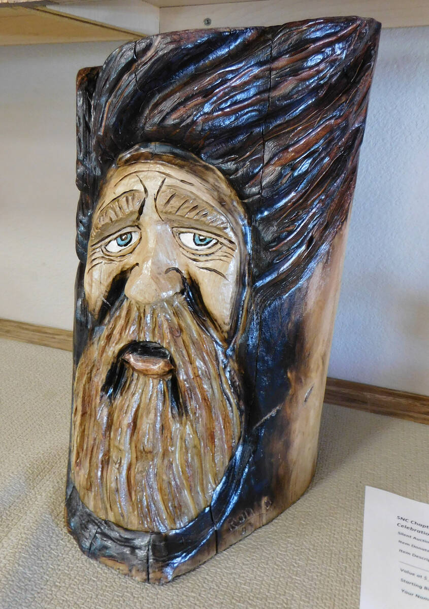 Robin Hebrock/Pahrump Valley Times The Helen Keller Days silent auction included several carved ...