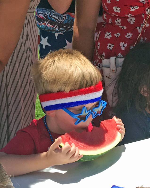 Robin Hebrock/Pahrump Valley Times With star glasses and a patriotic sweat band in place, a you ...