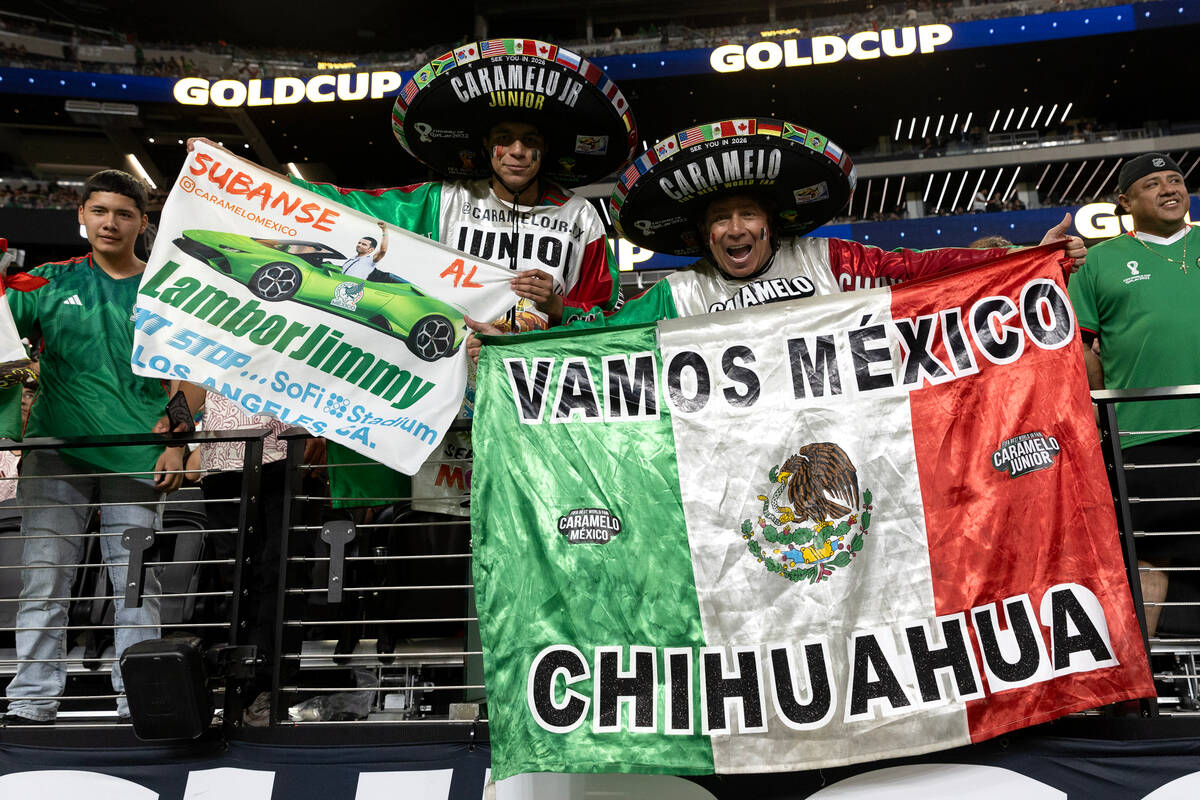Mexico fans are dressed in their team’s insignia before a CONCACAF Gold Cup semifinal so ...