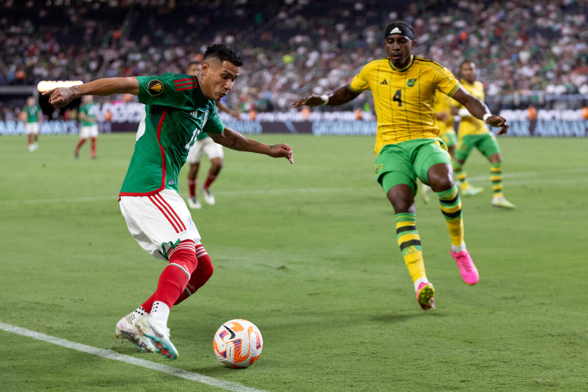Mexico forward Uriel Antuna (15) prepares to attempt a goal while Jamaica defender Amari'i Bell ...